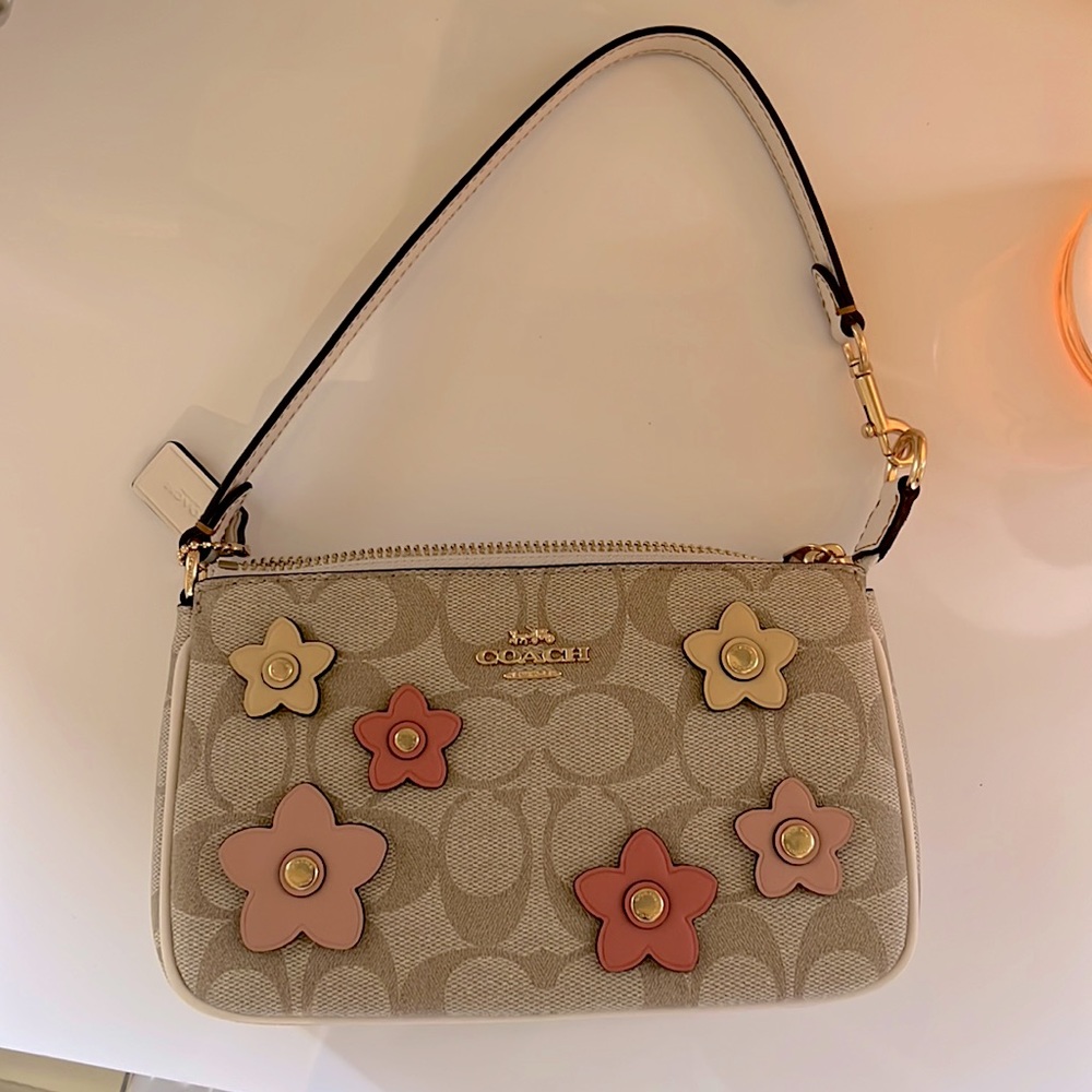 Coach women’s purse, brand new unused